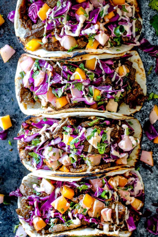 beef-bulgogi-korean-tacos-with-asian-pear-mango-slaw-and-gochujang-crema