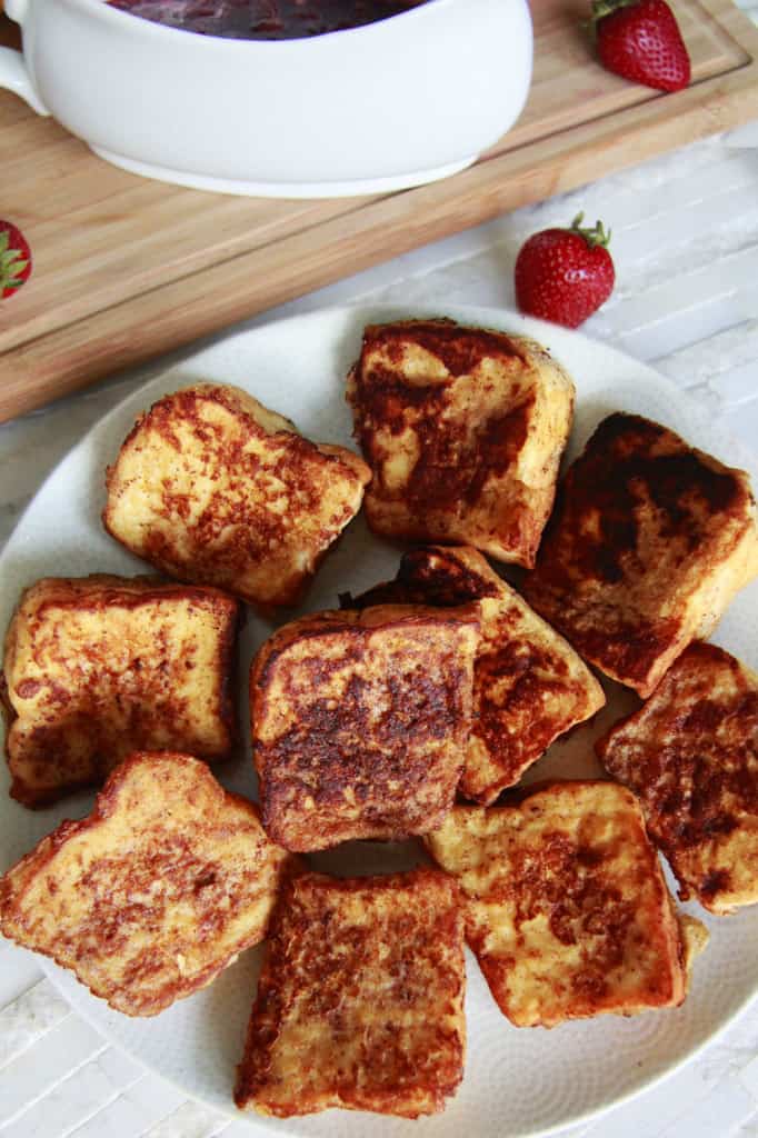 How to make Angel Food Cake French photo showing a plate of cooked french toast on a white plate. 