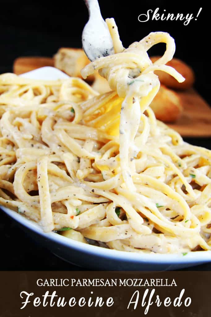 a fork spinning fettuccine Alfredo with healthy Alfredo sauce