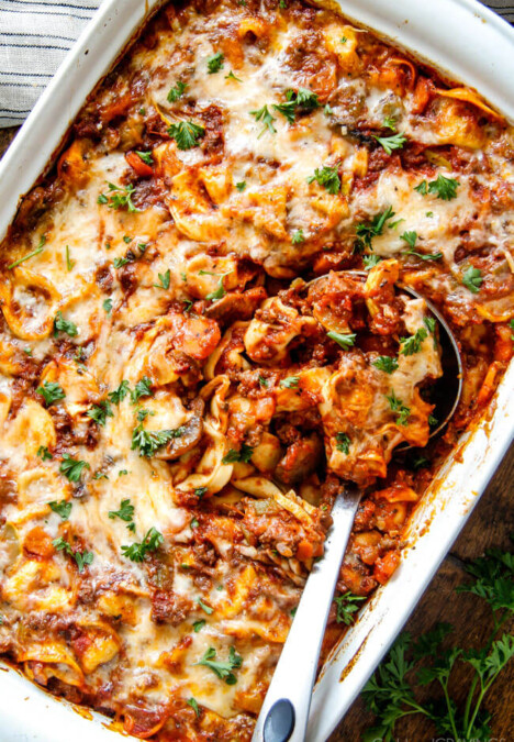 Cheesy Bolognese Tortellini Bake - This is my family's favorite pasta of all time - they BEG me to make it! The sauce is incredibly flavorful and the cheesiness can't be beat!
