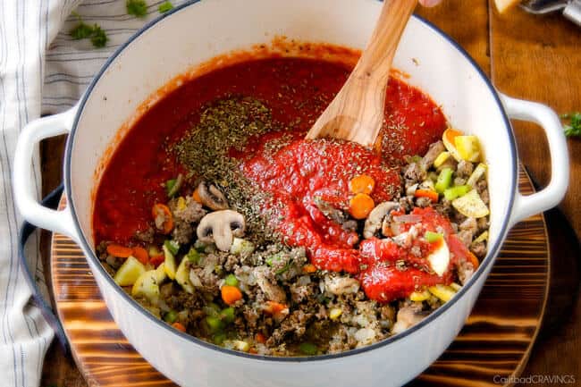 Adding sauce to cook for Cheesy Tortellini.