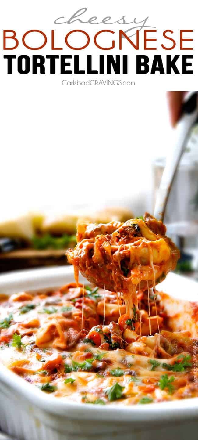 Cheesy Tortellini being served with a spoon.