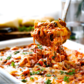 Cheesy Bolognese Tortellini Bake - This is my family's favorite pasta of all time - they BEG me to make it! The sauce is incredibly flavorful and the cheesiness can't be beat!