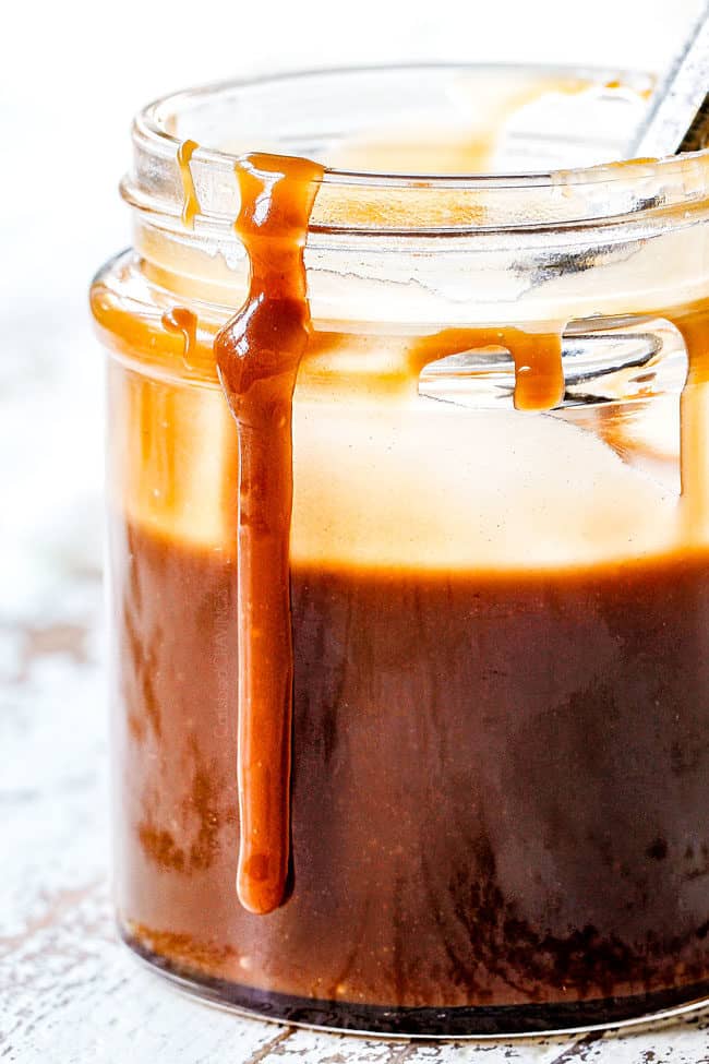 homemade caramel sauce in a glass jar