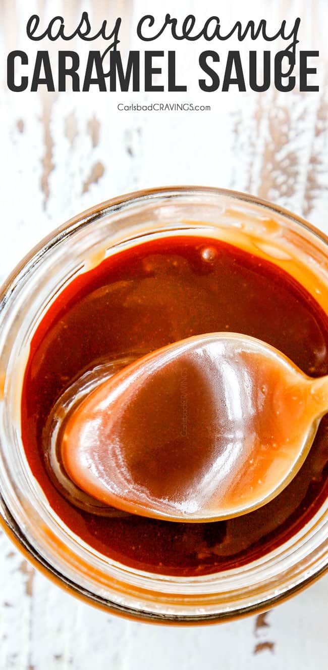 top view of a spoon dipping into easy caramel sauce in a jar
