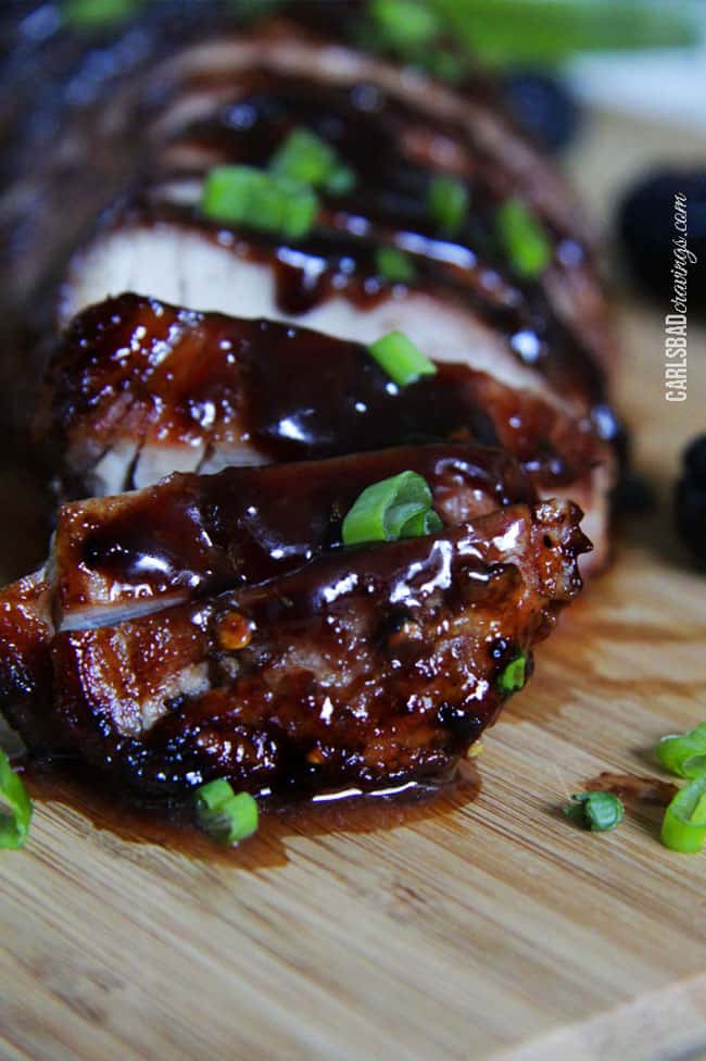 best pork tenderloin recipe sliced on a cutting board