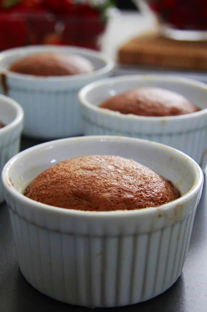 showing how to make chocolate lava cakes in ramekins by baking until lava cakes are set