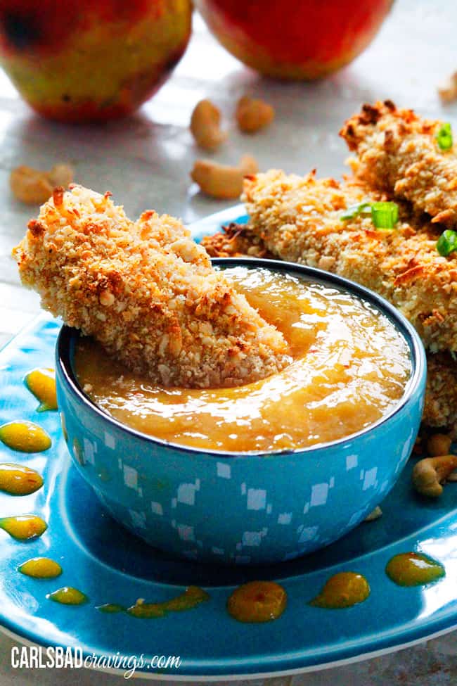 easy Coconut Crusted Chicken tenders with dip on a tray