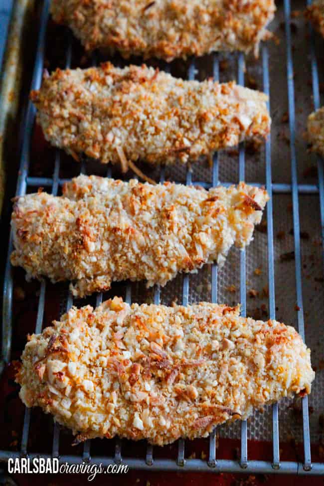 showing how to make  Coconut Crusted Chicken by baking until golden
