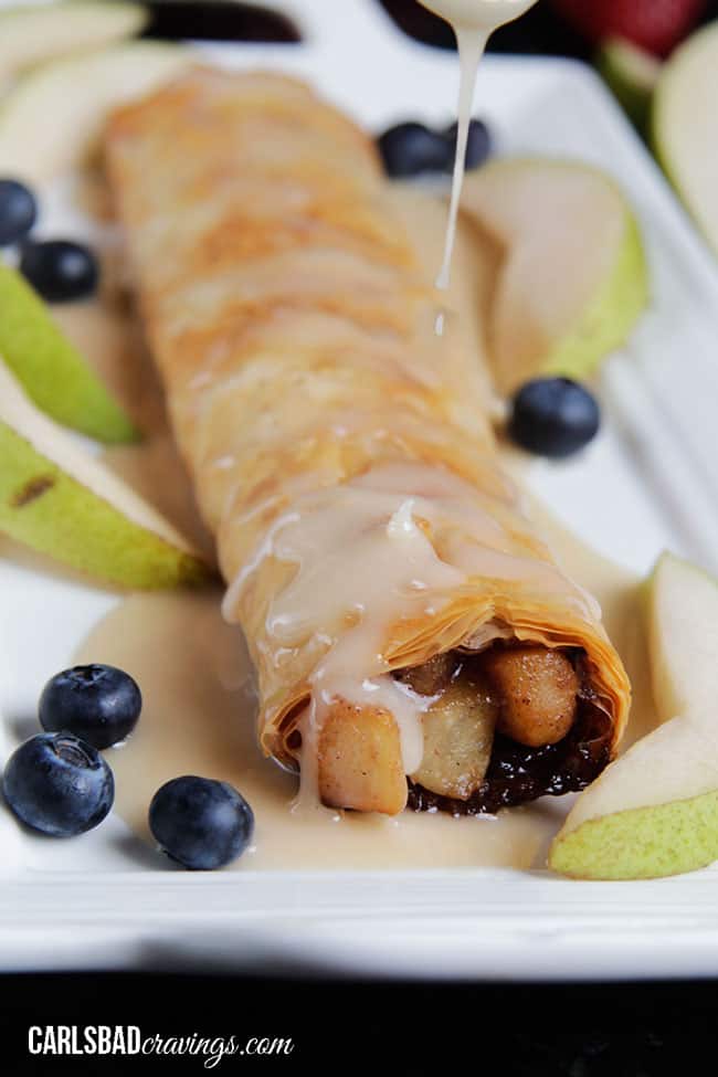 showing how to make apple strudel by adding vanilla glaze
