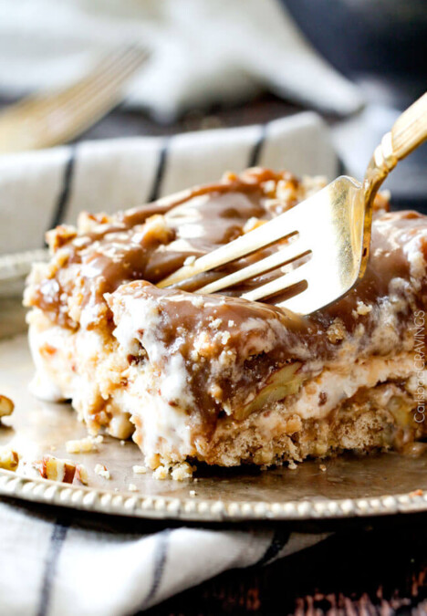 This Toffee Caramel Ice Cream Cake is amazing and so easy! I love the pecan cookie crumble and the caramel sauce is out of this world! Perfect make ahead dessert!