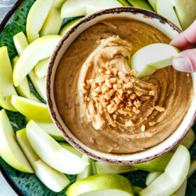 5 Minute Cream Cheese Toffee Apple Dip is my go-to party dip!  Its rich and creamy with crunchy, sweet toffee bits and couldn't be any easier!  Everyone goes crazy for this dip!