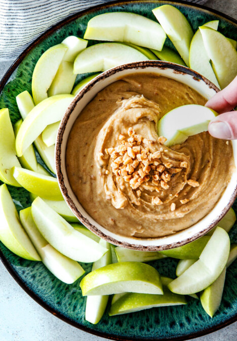 5 Minute Cream Cheese Toffee Apple Dip is my go-to party dip!  Its rich and creamy with crunchy, sweet toffee bits and couldn't be any easier!  Everyone goes crazy for this dip!