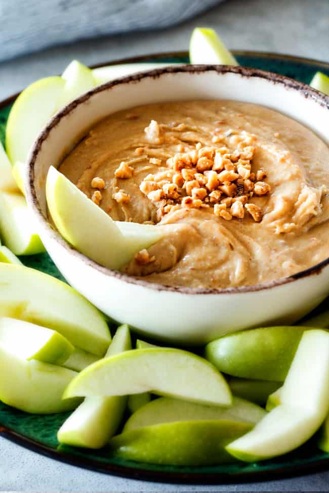 up close of cream cheese apple dip in a bowl