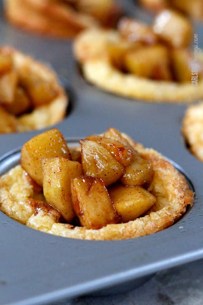 showing how to make German Apple Pancakes by filling with caramelized apples