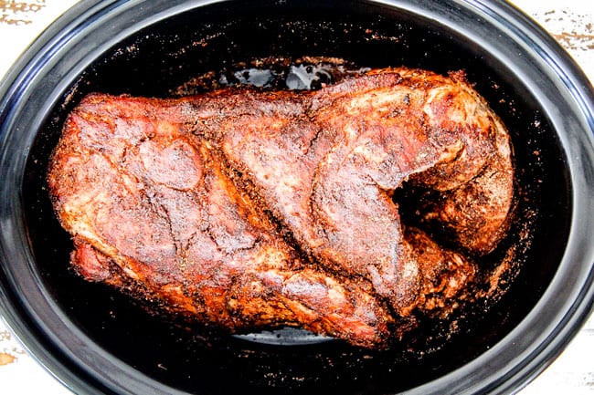 spiced rubbed pork in crockpot making Cafe Rio sweet pulled pork