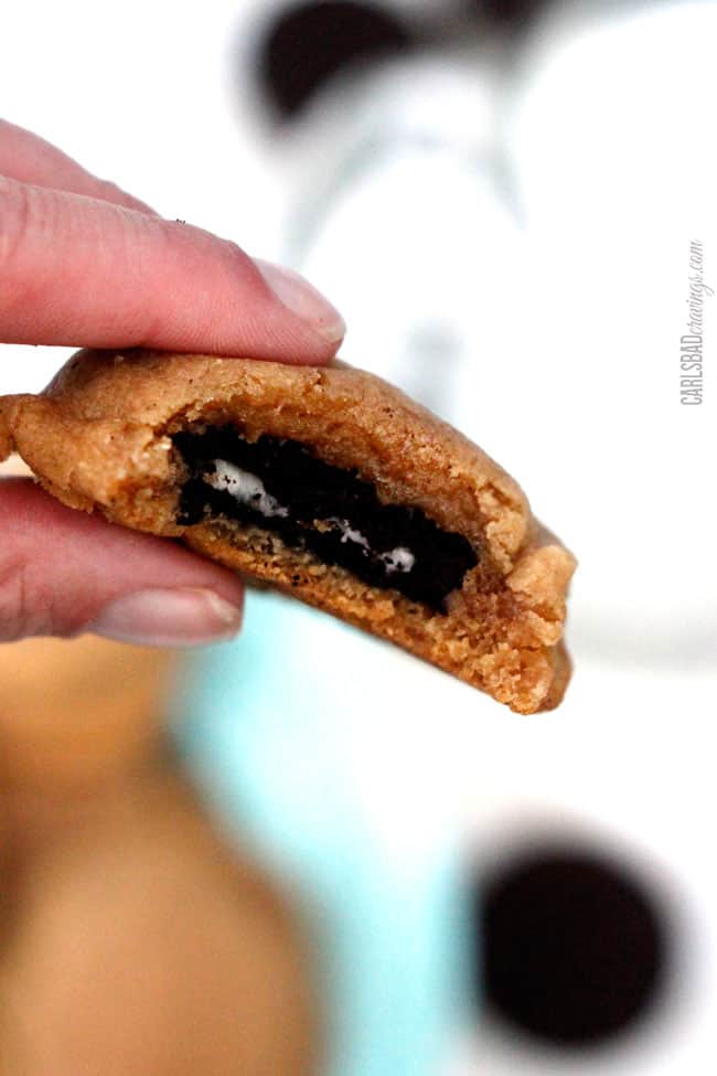 a hand holding the best Oreo Stuffed Cookie recipe