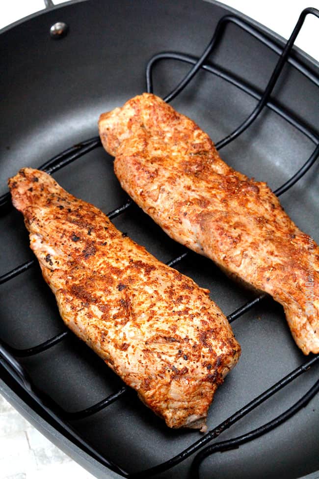 Showing how to make Cajun Pork Tenderloin by cooking it in a oven pan.