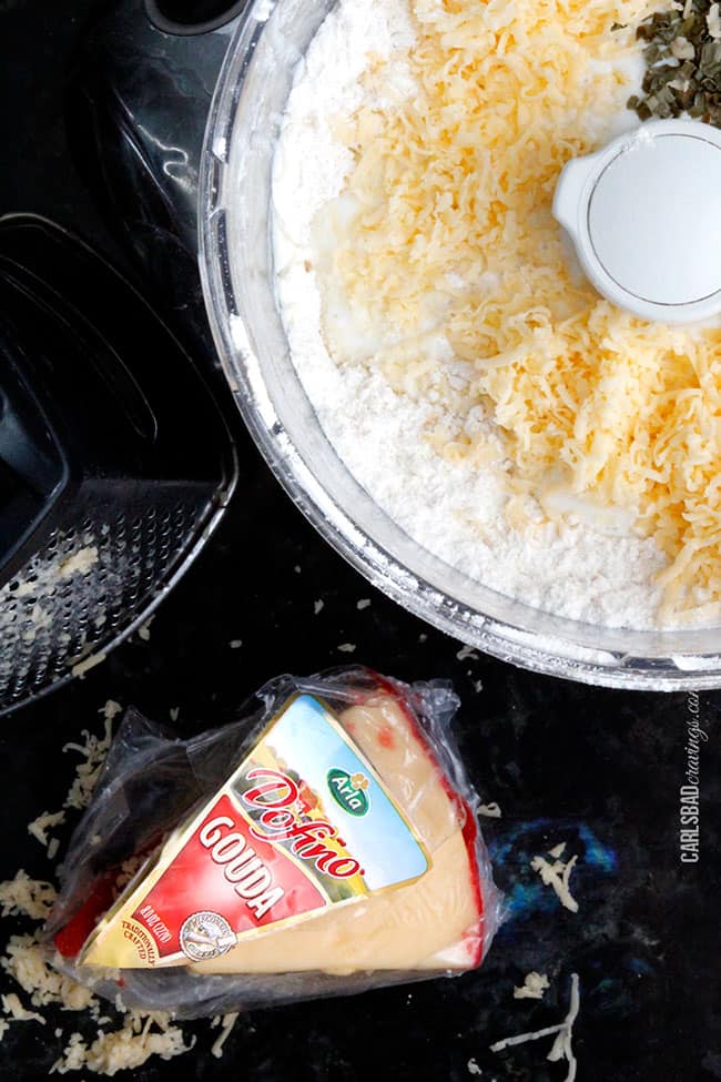 Showing how to make a Breakfast Pot Pie by blending cheese and flour in a food processor. 