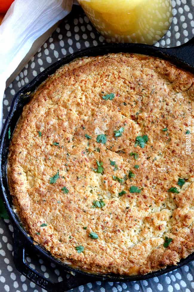 Showing how to make a Breakfast Pot Pie in a black cast iron skillet garnished with parsley.