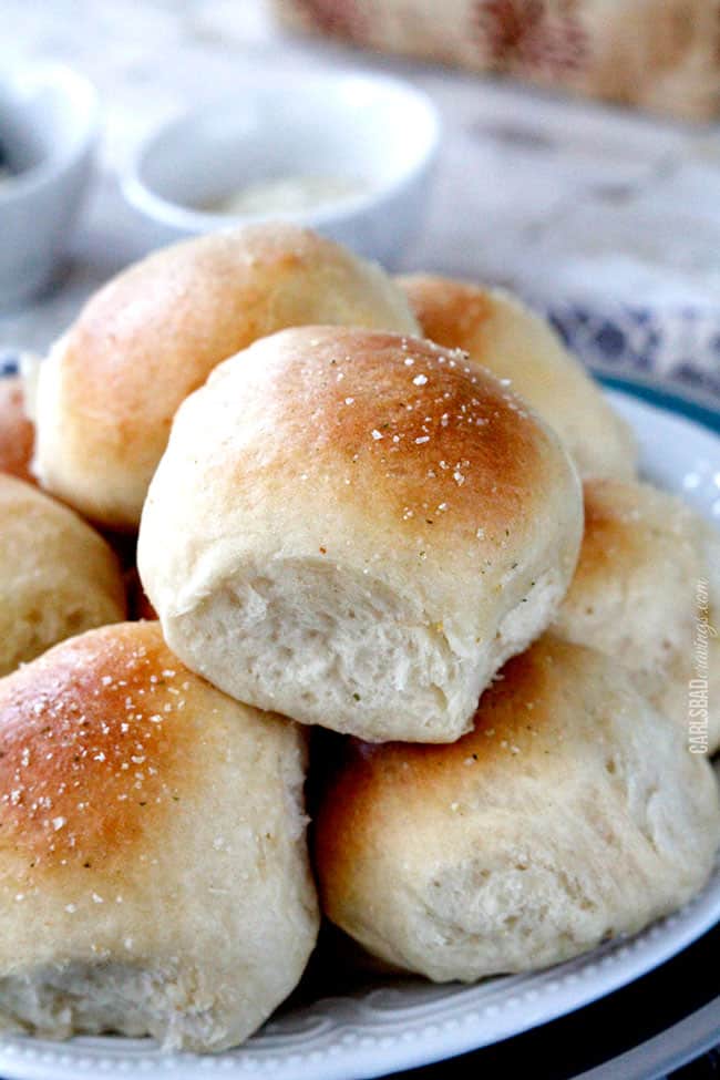 up close of best Dinner Roll recipe on a white serving plate. 
