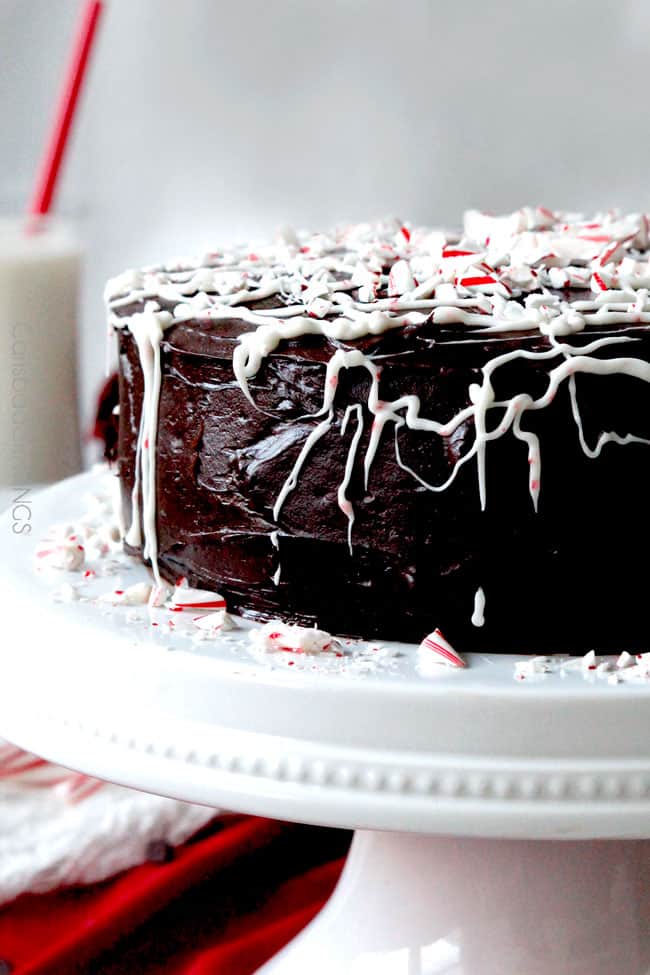 showing how to make Chocolate Peppermint Cake by garnishing with candy canes 