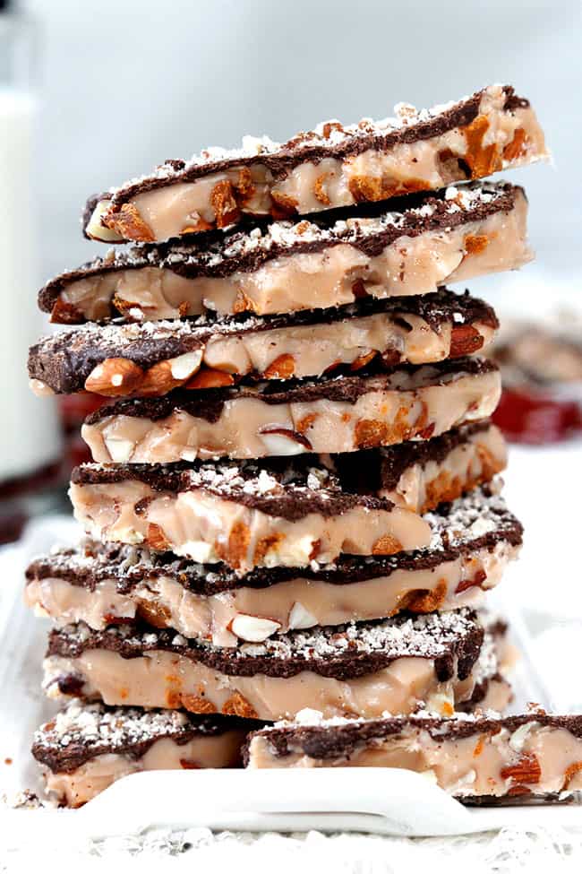 Side view of Toffee with Chocolate, Almonds and Pecans stacked up tall.