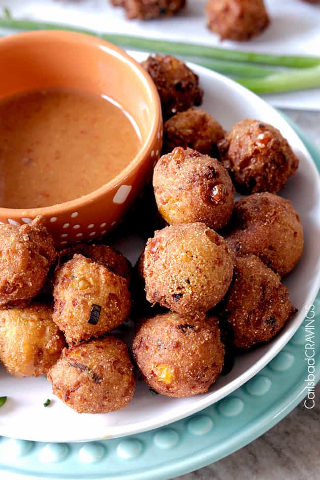 a plate of crispy southern hush puppies reciipe