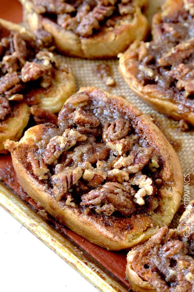 showing how to make French Toast Bake by taking golden French Toast out of the oven