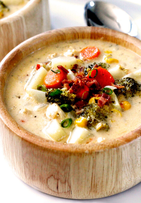 Flavor packed, EASY creamy, cheesy comforting Slow Cooker Bacon Ranch Chicken Chowder is the ultimate comfort soup packed with corn, potatoes and broccoli with NO butter or cream but SO much flavor!! #broccolicheesesoup #chowder #potatosoup