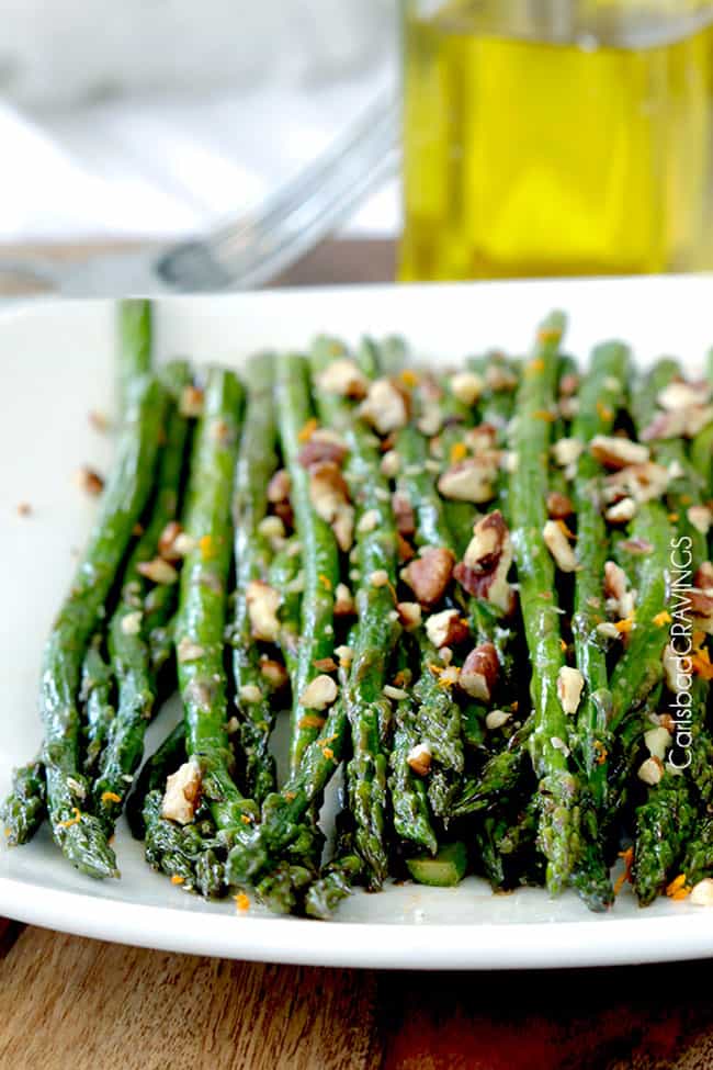 Roasted balsamic Asparagus on white plate 