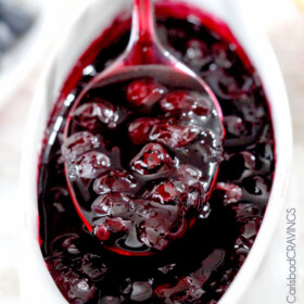 10 Minutes to the BEST Blueberry Sauce or Syrup ever! Amazing on cheesecake, pancakes, crepes, French Toast, etc. and SO EASY! #syrup #blueberries #cheesecake #blueberrysauce #blueberrysyrup