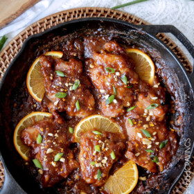 One pan, 30 minute easy Sticky Thai Peanut Orange Chicken baked in one of my favorite rich, nutty, sweet, savory orange sauces ever. I am so in love with the flavors and ease of this dish! #thai #orangechicken #peanutchicken #thaipeanutchicken #drumsticks #30minutemeals