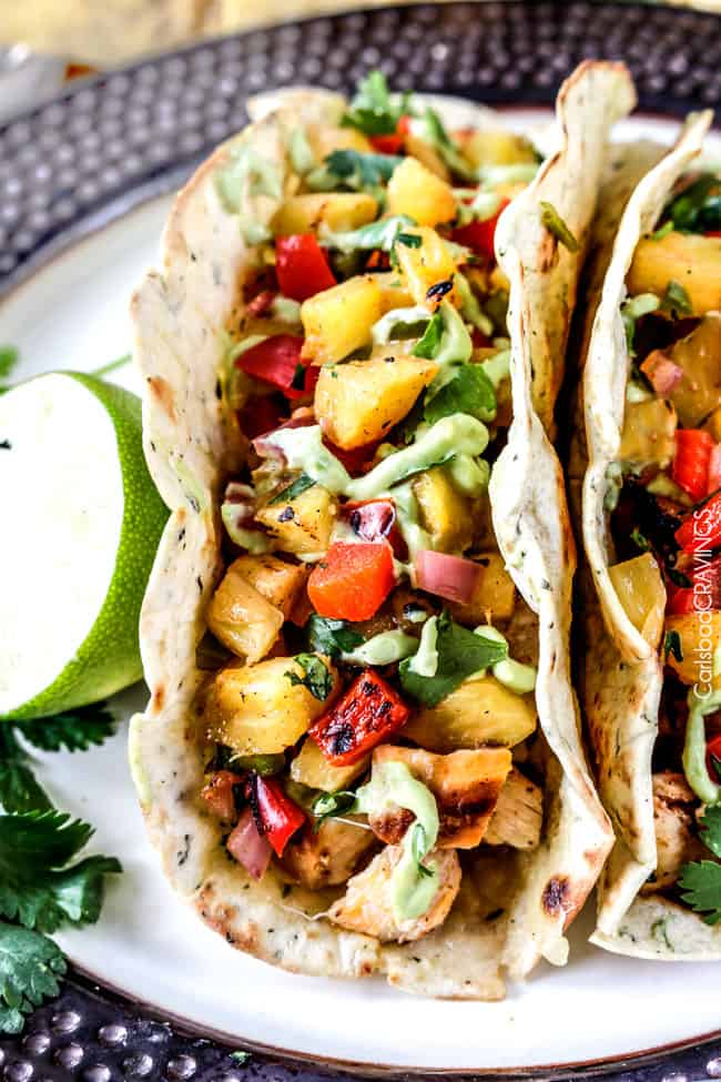 Chili Lime Chicken Tacos with refreshing sweet and smoky Grilled Pineapple Salsa, oozing Jack cheese and silky Avocado Crema are crowd worthy but easy enough for everyday.