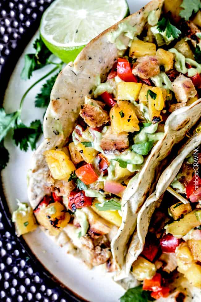 Chili Lime Chicken Tacos with refreshing sweet and smoky Grilled Pineapple Salsa, oozing Jack cheese and silky Avocado Crema are crowd worthy but easy enough for everyday.