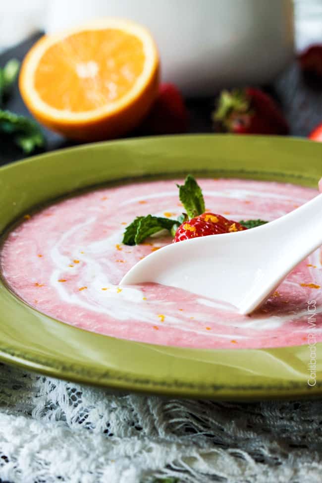 a spoon scooping into chilled Strawberry Soup 