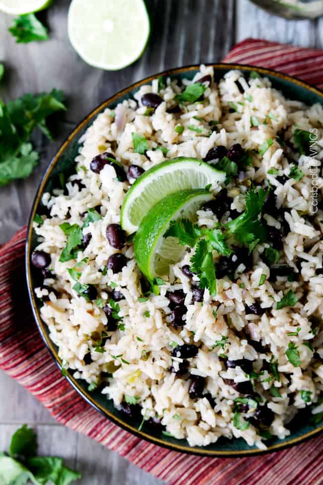 Cilantro Lime Rice with cilantro and lime on top in a bowl.