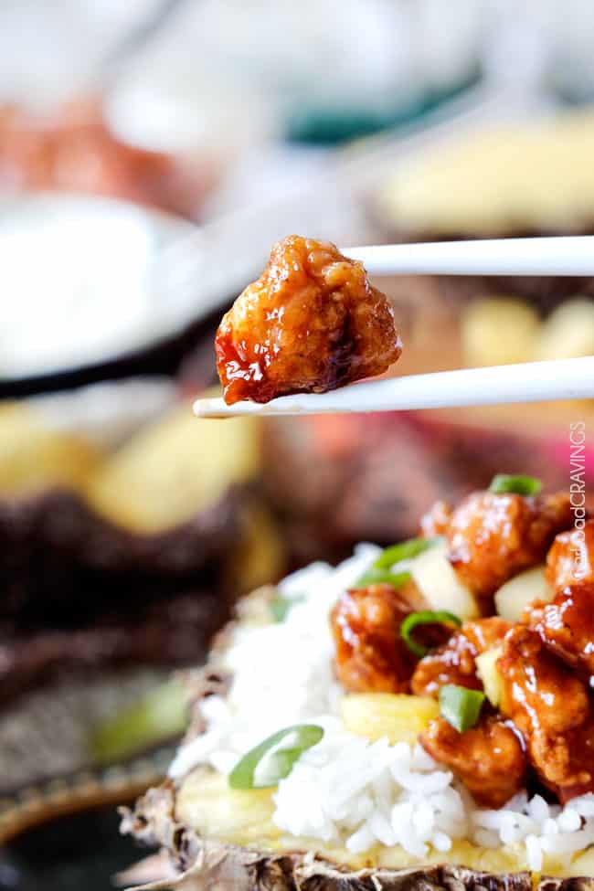 Baked Chinese Pineapple Chicken with chopsticks.