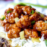 Pineapple Ginger Chicken Recipe on a bed of white rice.