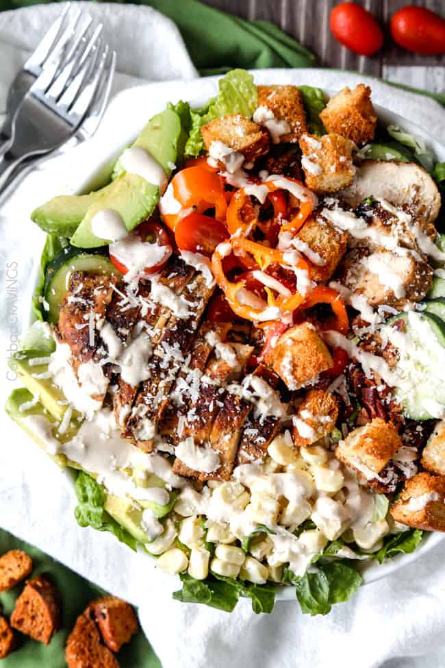 Garden Caesar Salad bursting with not only Parmesan cheese and homemade croutons but crispy bacon, fresh corn, avocados, tomatoes, cucumbers etc. and the most tender, juicy Lemon Basil Chicken all bathed in luscious homemade Caesar Dressing.