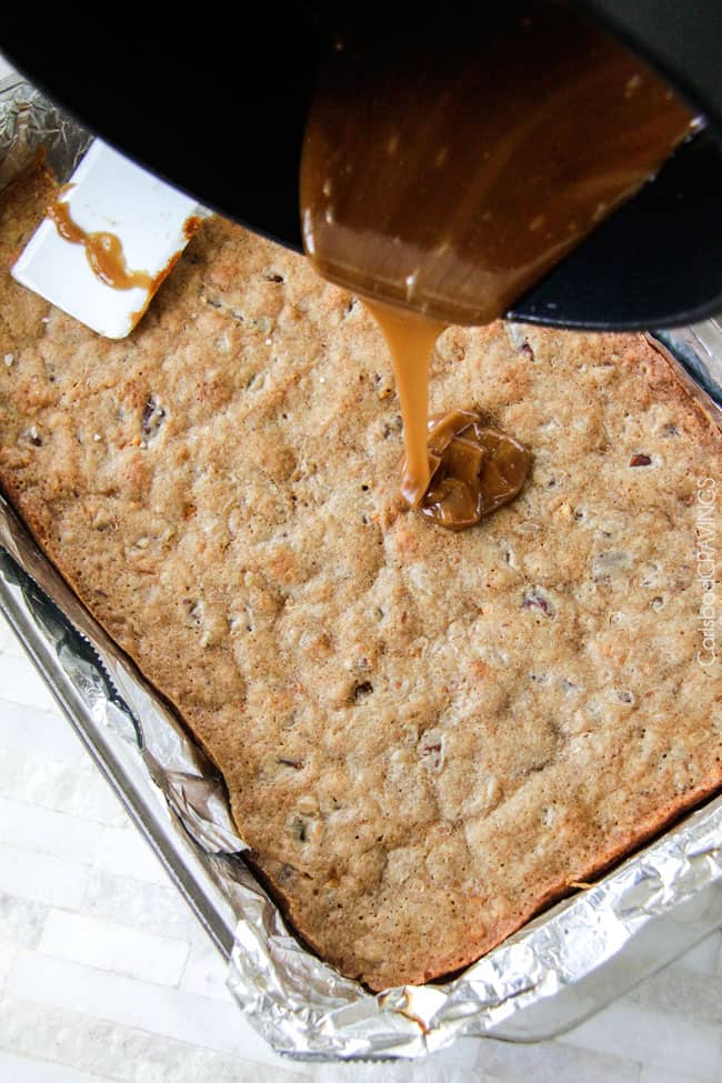 showing how to make blondies by pouring Butterscotch glaze over the bars