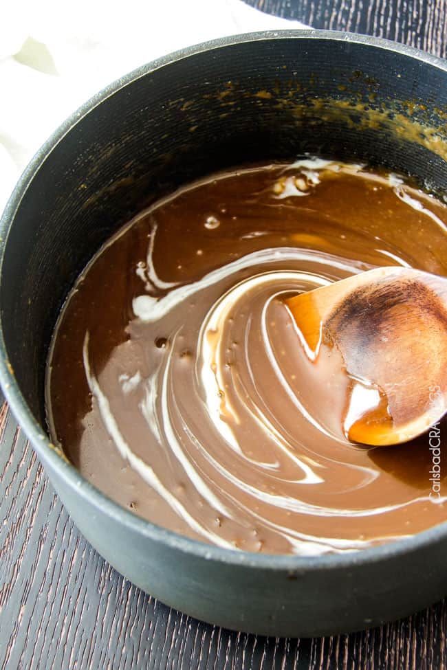 Showing how to make Coconut Caramel Sauce mixing in a pan.