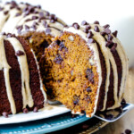 Moist, rich Chocolate Chip Pumpkin Cake infused with chocolate and bathed in in Cinnamon Pumpkin Cream Cheese Glaze is SO good! The only cake you need for Fall!