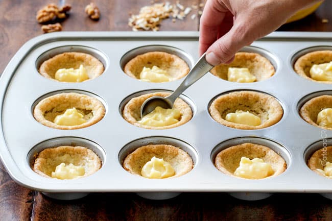 Showing how to make Mini Banana Coconut Cream Pies by adding pudding in muffin pan.