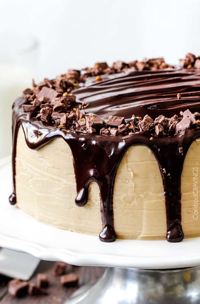 Crazy moist Caramel Milk Chocolate Cake, busting with milk chocolate toffee bits, coated in Caramel Icing and smothered in silky chocolate ganache. THE only chocolate cake recipe you need!