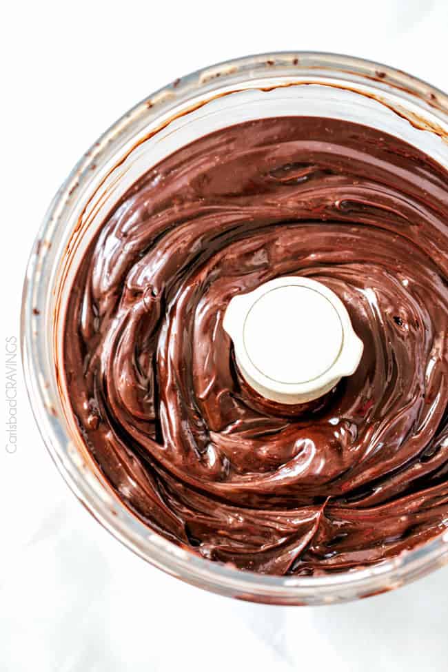 Showing how to  make Peanut Butter Chocolate Mousse by blending chocolate. 