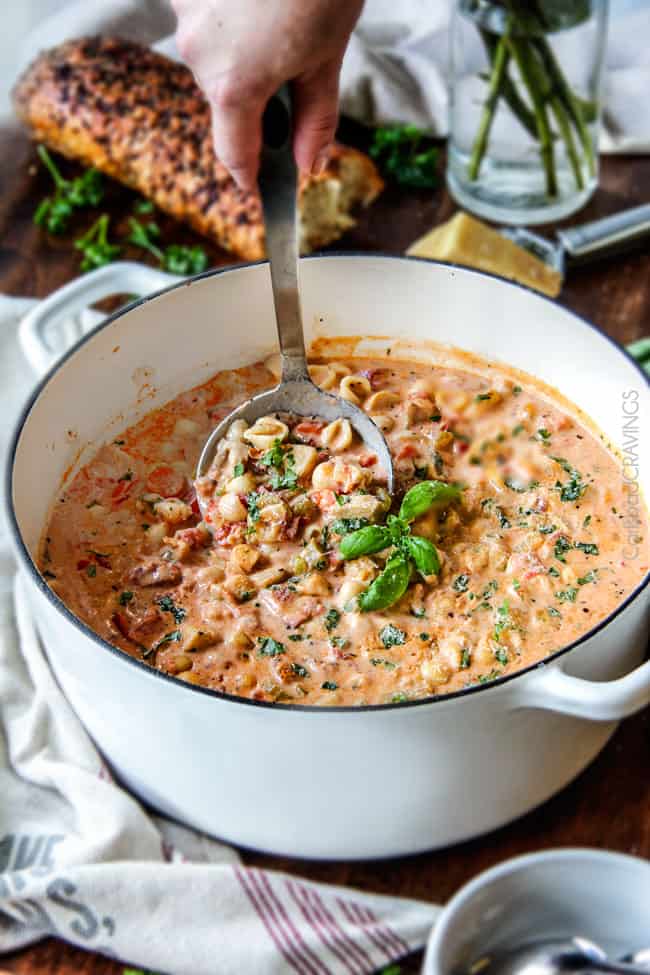 Creamy Italian Soup tastes better than any restaurant soup! Super easy and seasoned to perfection bursting with tender chicken, tomatoes, carrots, celery and macaroni enveloped by creamy Parmesan.