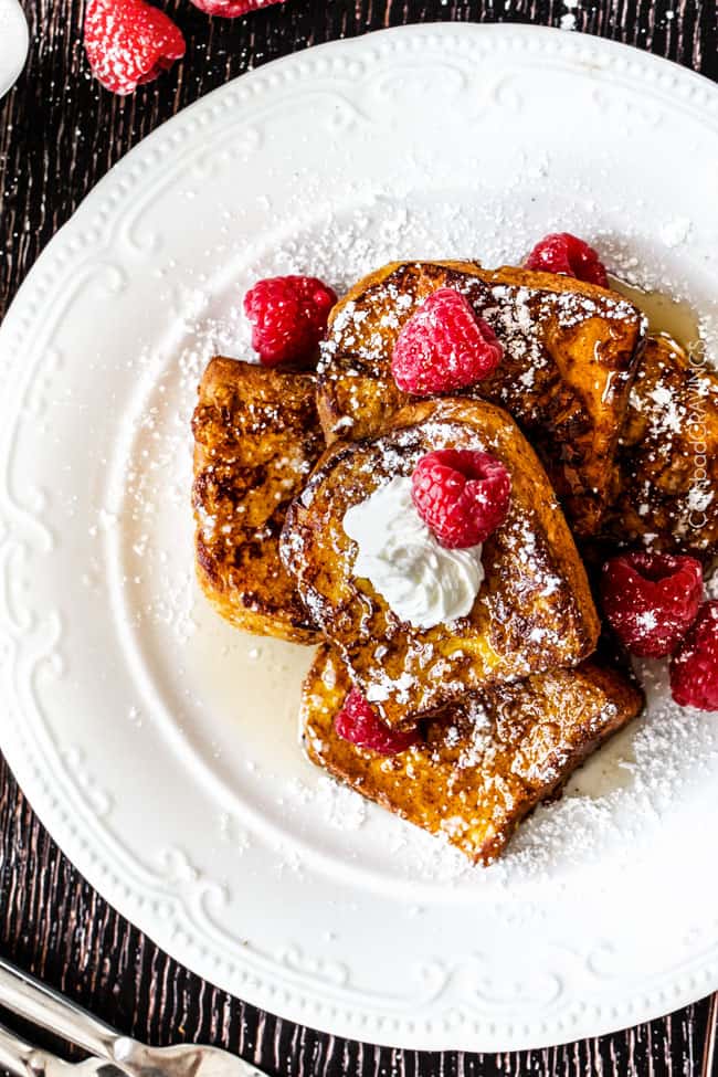 Pumpkin French Toast with berries and cream on top. 