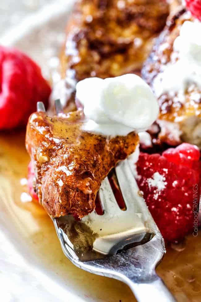 A large bite of Pumpkin Spice French Toast on a fork. 