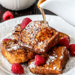 BEST Pumpkin French Toast Ever! Angel food Cake French toast dipped in Pumpkin batter - the perfect texture of toasted on the outside, light, airy and slightly sweet cake heaven on the inside.